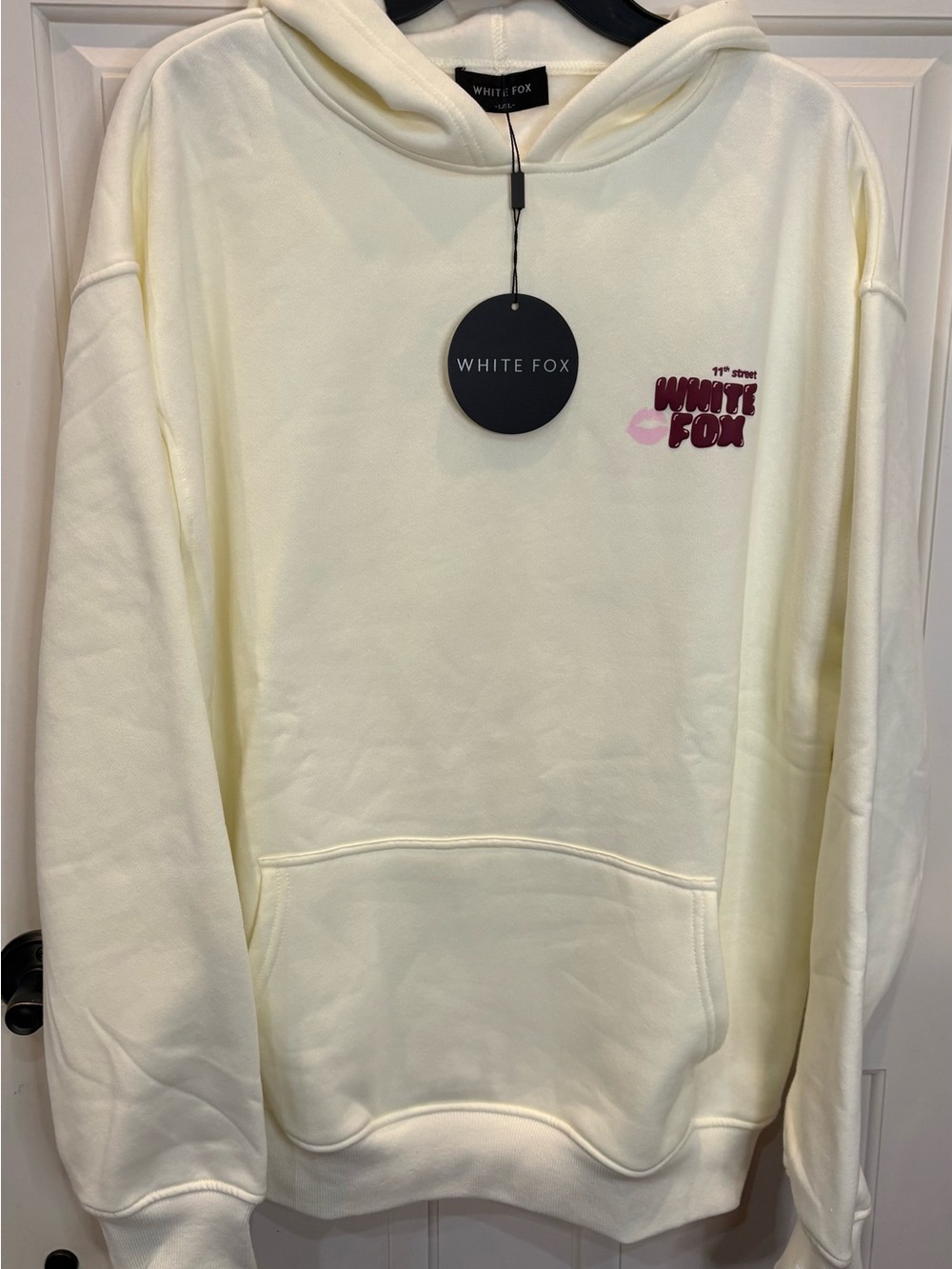 White Fox Boutique Cream Hoodie with Pink Logo